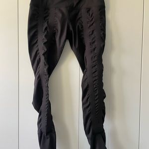 2 pair of Sweetflexx resistance band leggings.